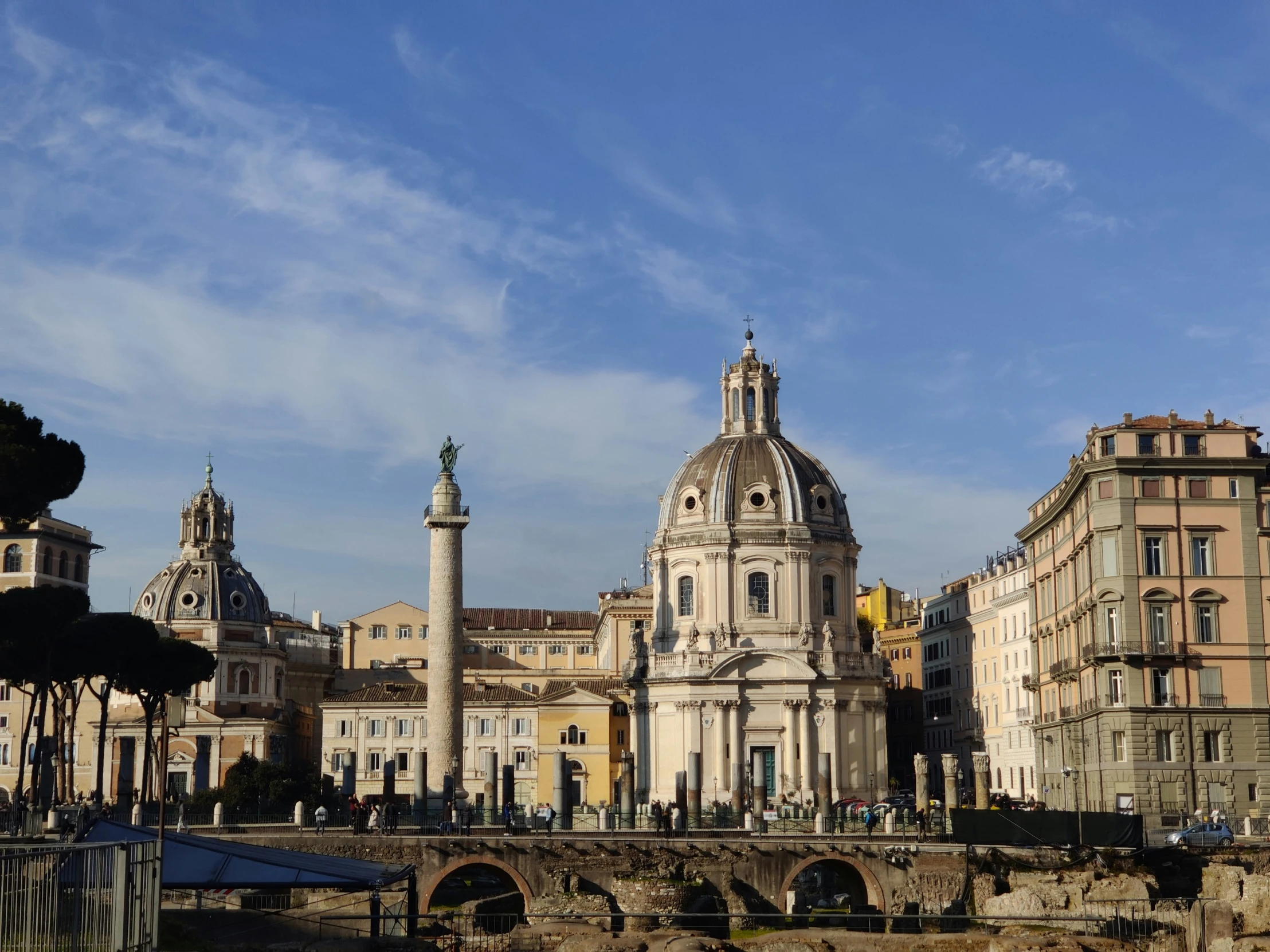 a small city by some river with a bridge