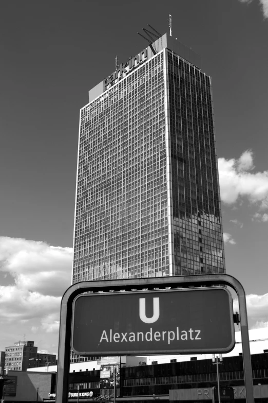 a very tall building on the side of a street