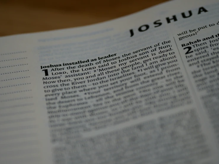 an open book that has a list of joshua