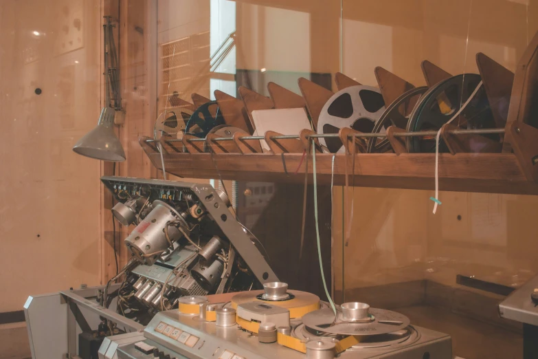 an old style machine has been built into a shelf