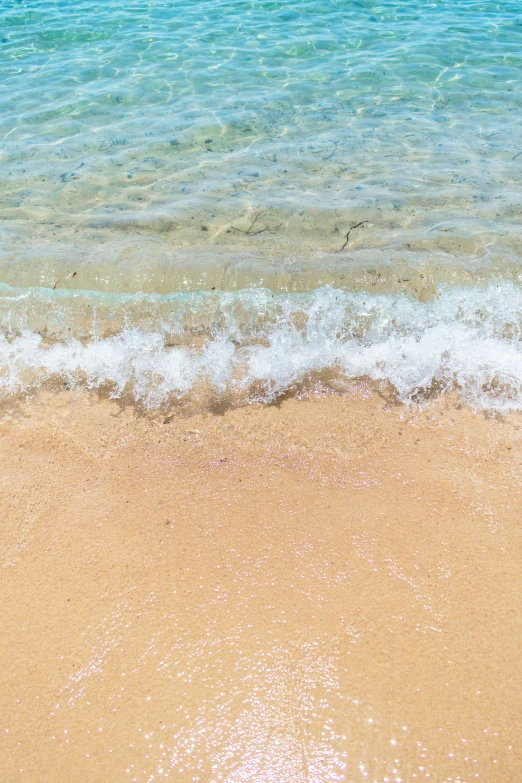 water that has come up out from the shore with waves