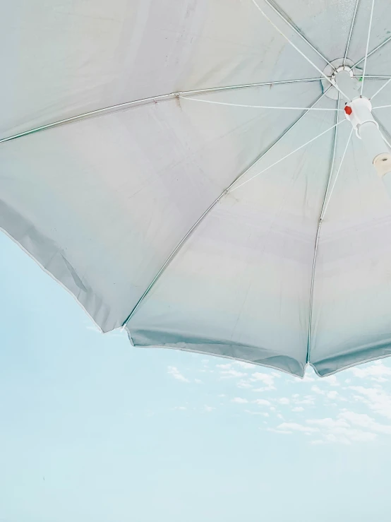 an umbrella that is open to the sky