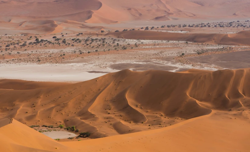 a wide view of sand dunes and deserts