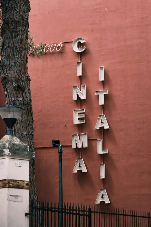 large metal letters are shown for the latin language