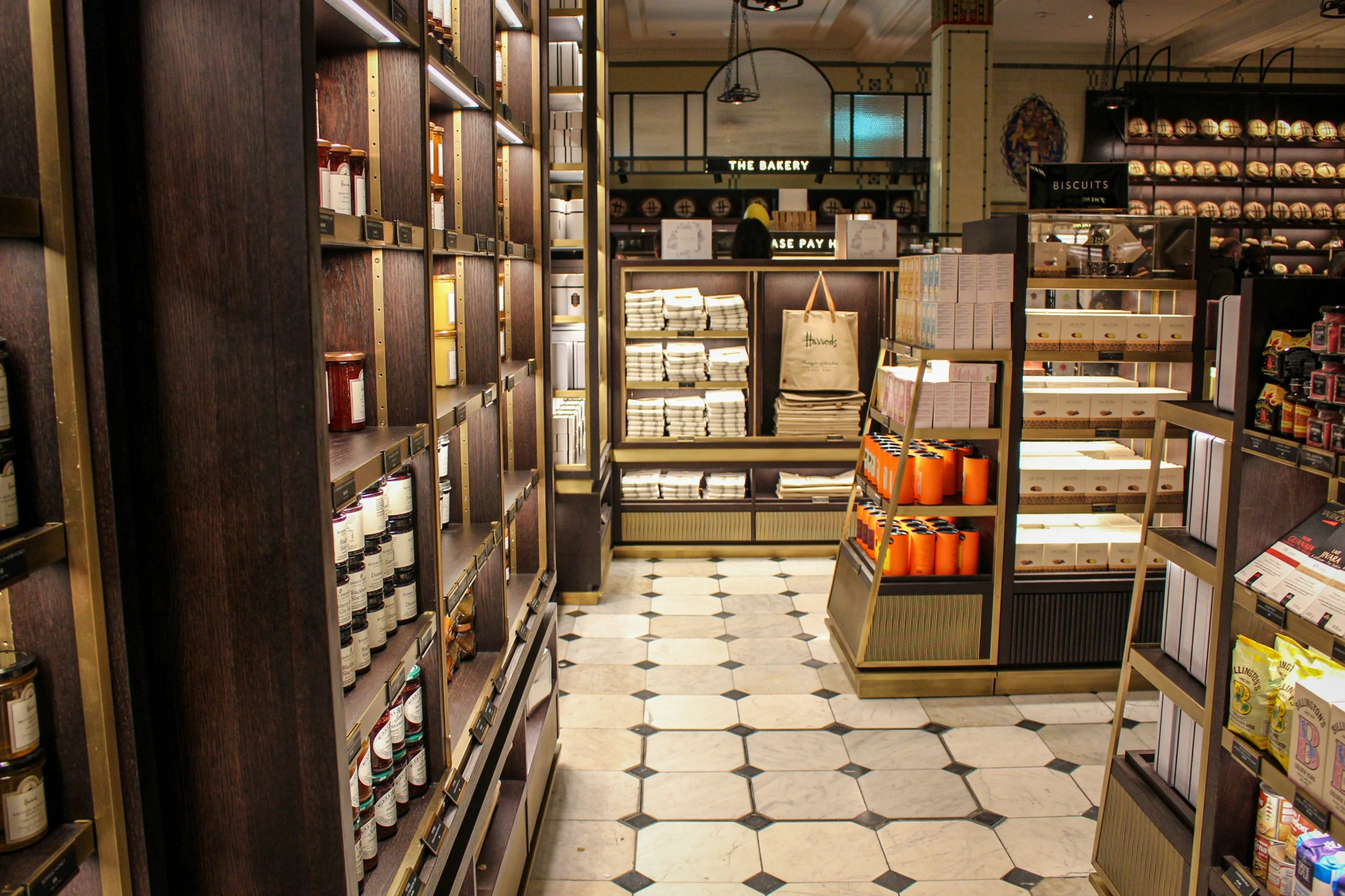 a store with several shelves and shelves full of bottles