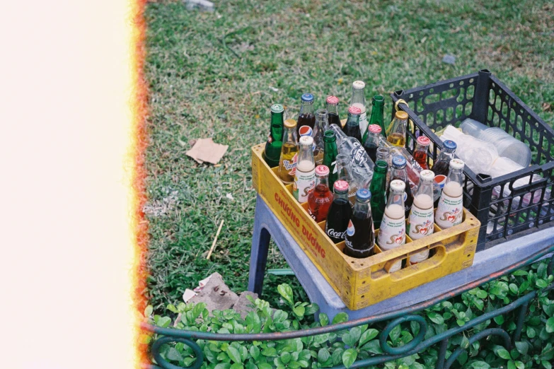 a bunch of beer bottles are in a crate