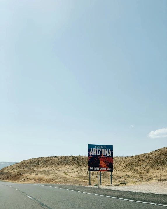 a sign on a highway reading the arizona highway