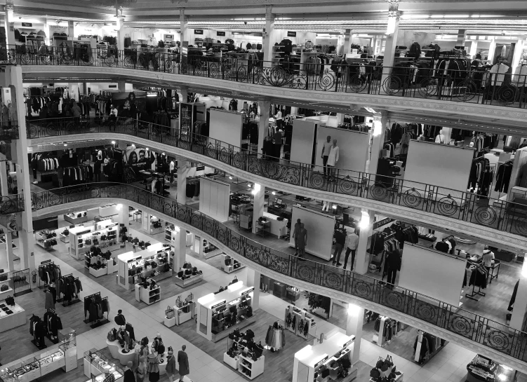 a black and white pograph of people at an event