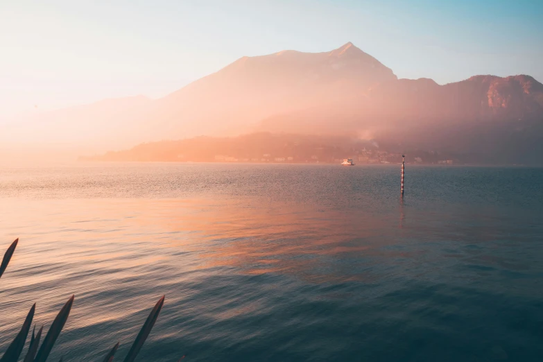 an image of a mountain on a lake