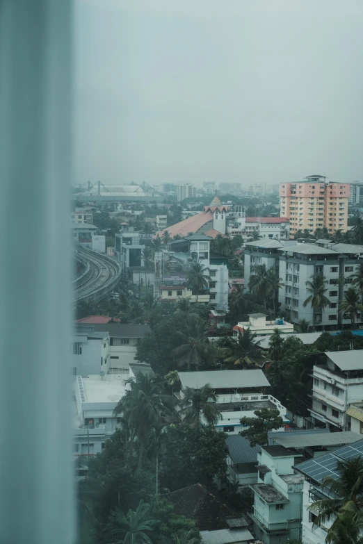 a city view with lots of traffic and trees