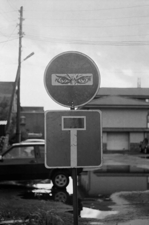 an old po of a back drop basketball hoop on the side of a road