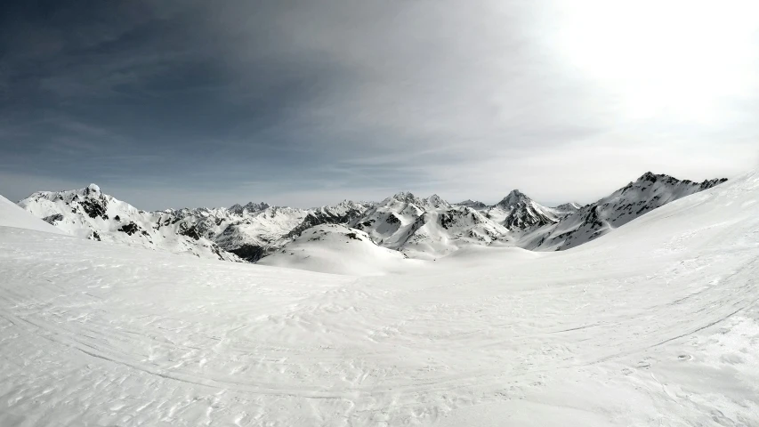 the snow is white in color but it still has tracks on them