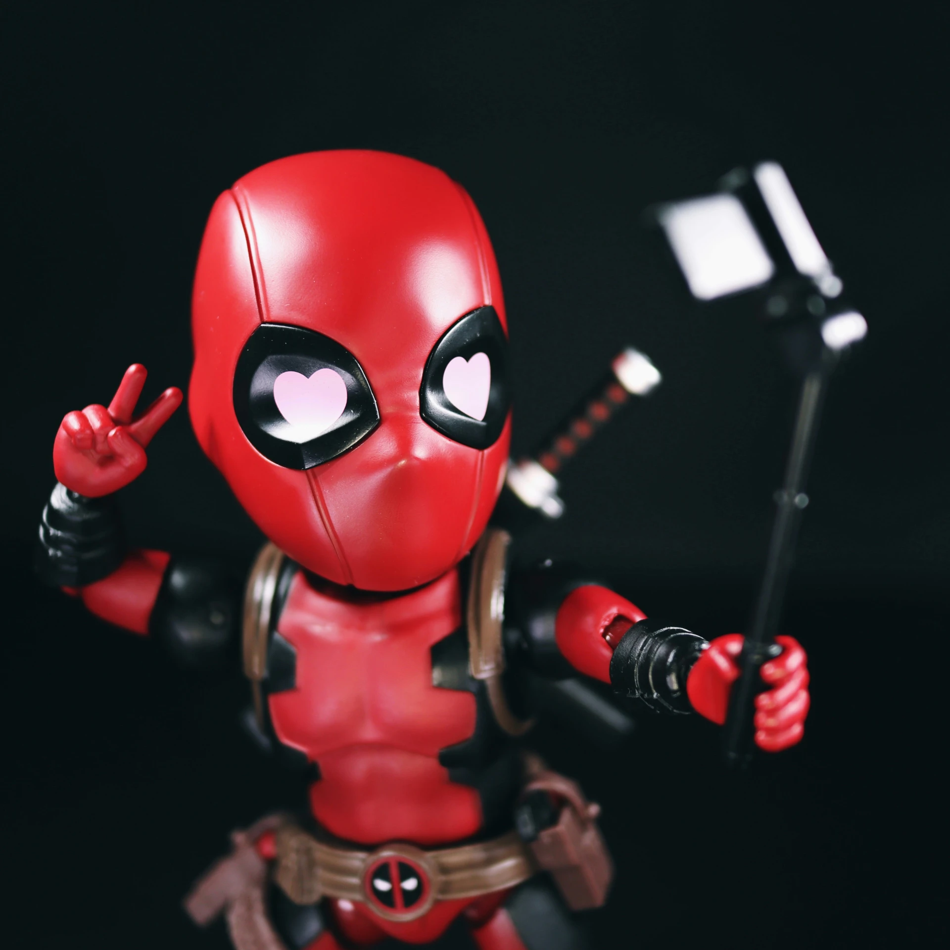 an action figure in action posed with a knife and tool