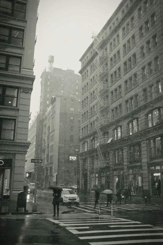 a city street in the middle of a rainy day with people holding umbrellas