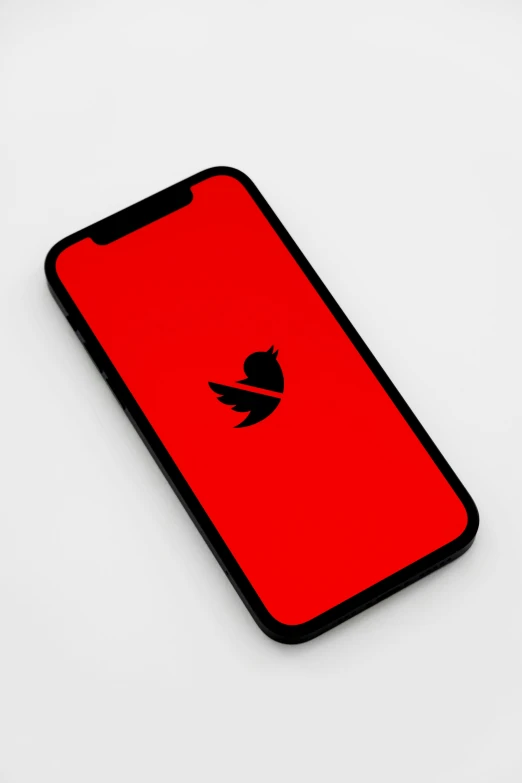 the back side of an iphone with an iphone case in black and red