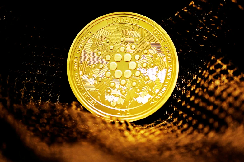 a yellow coin with some bubbles and dots on it