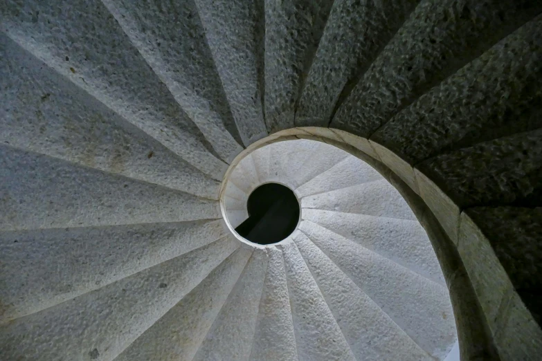 a round hole at the bottom of a spiral stair