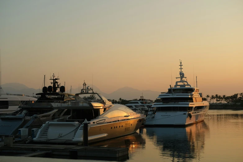 some boats are lined up on the dock