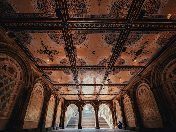 a room with arches and a floor made of tiles