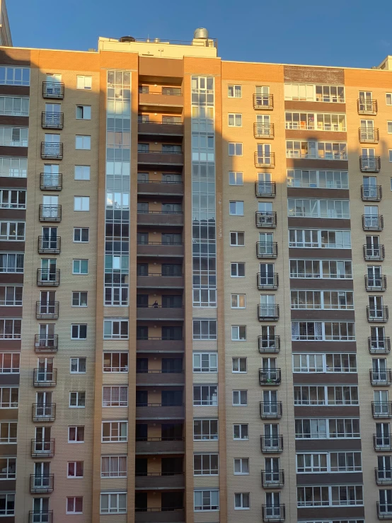 a tall building with lots of windows on top of it