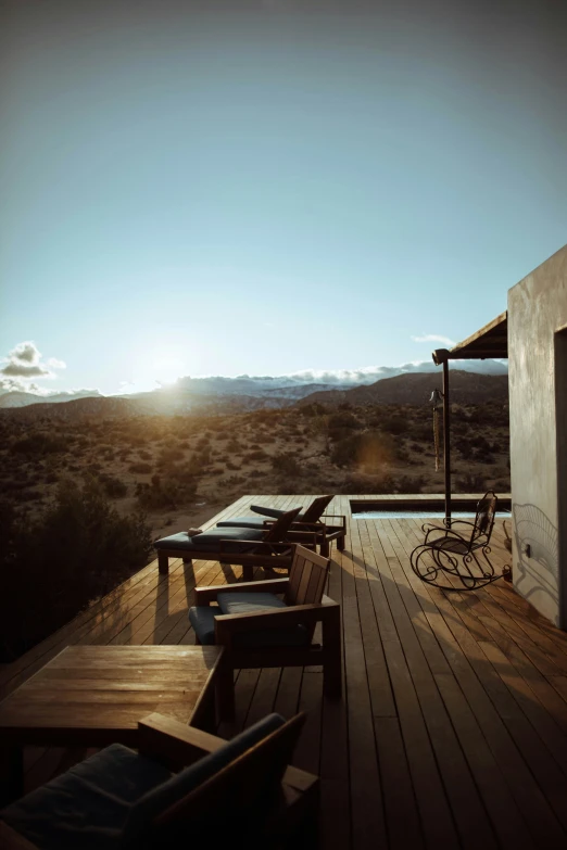 an outdoor table that is set up to enjoy a view