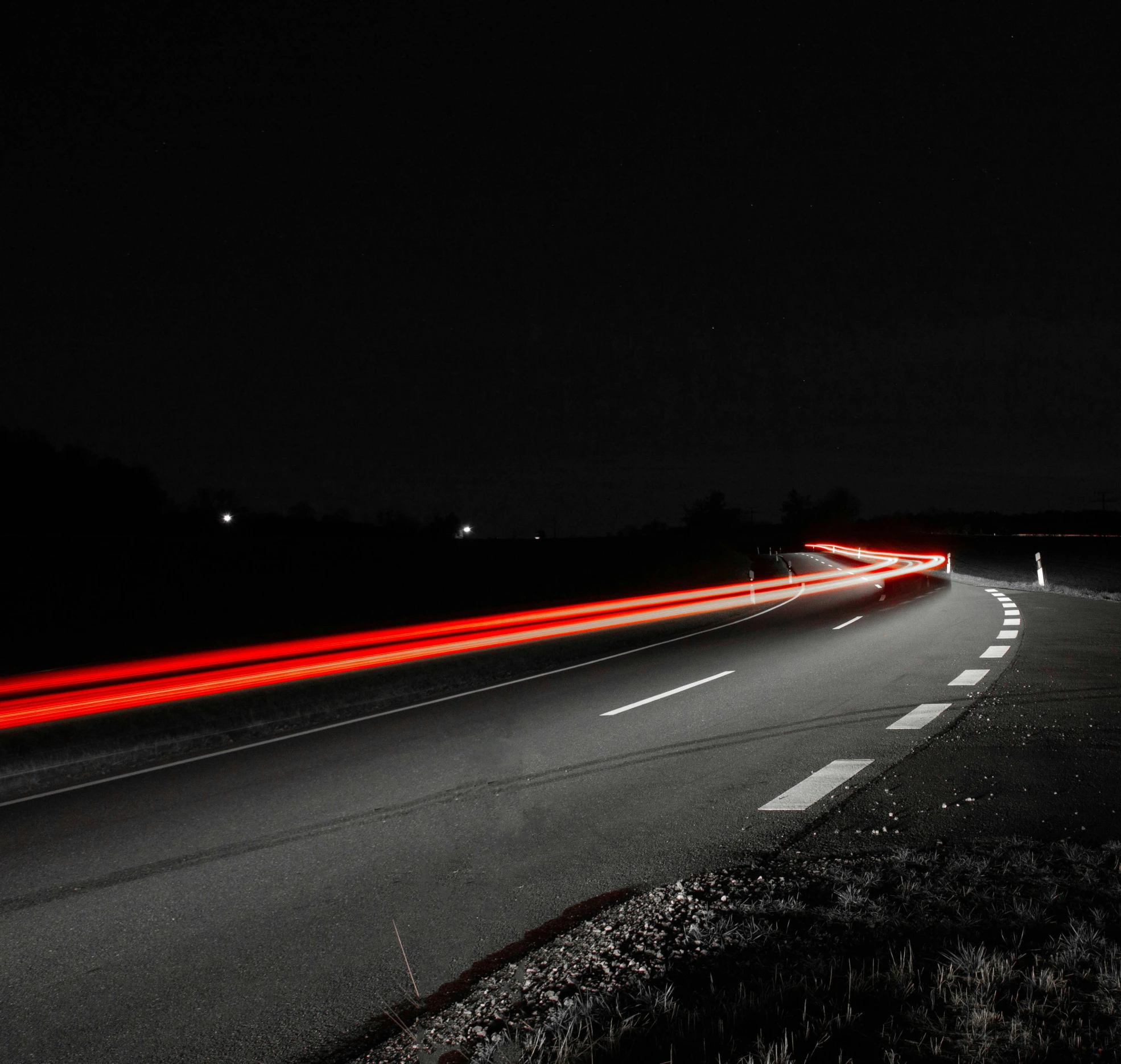 a long exposure po of a street at night