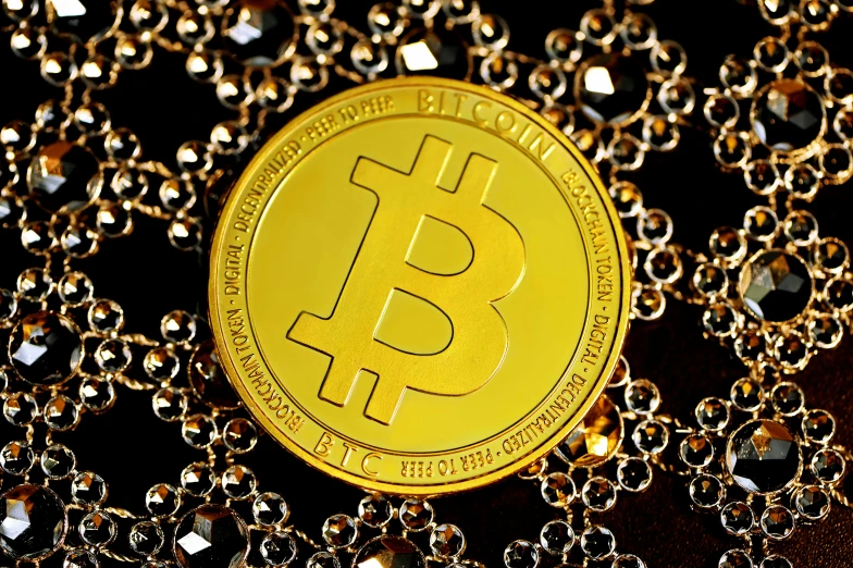 a bitcoin is shown with a chain around it