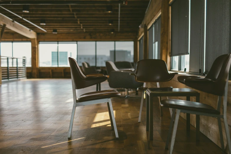 a waiting room with chairs and tables