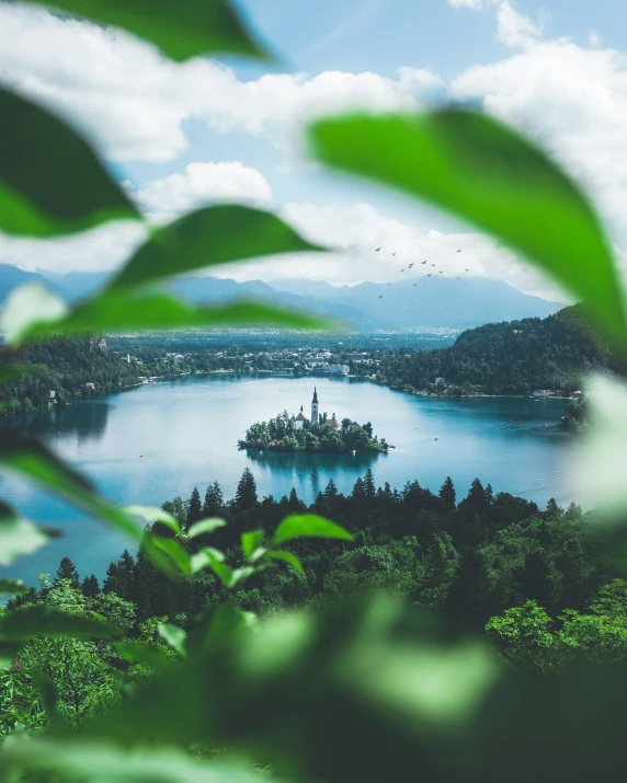 an island sits on an island in the middle of a lake