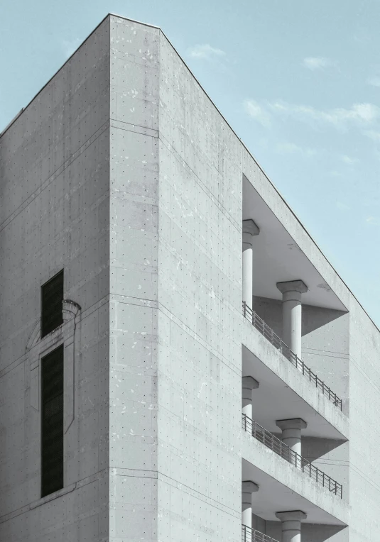 an apartment building with stairs and windows