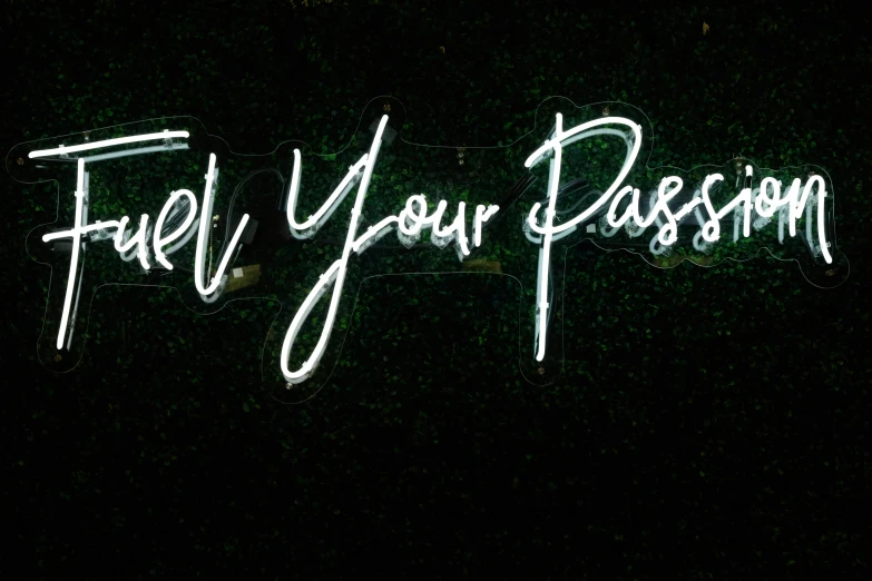 a neon sign that says fuel your passion