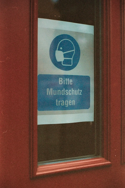 sign on glass door telling which directions to the area