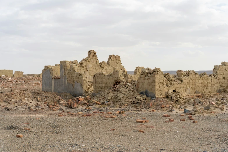 an image of ruins in the desert with a sky background