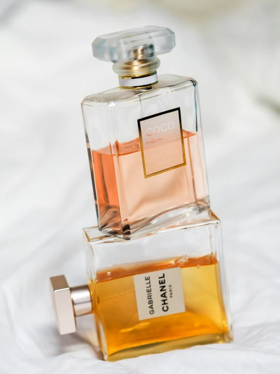 a bottle of perfume on a white background