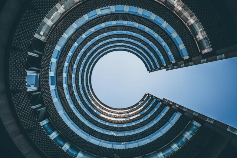 the inside of a building with blue and black circles