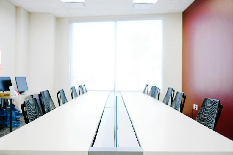 a long table with chairs around it