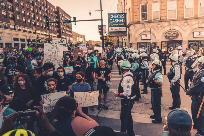 the protesters in the city are holding signs