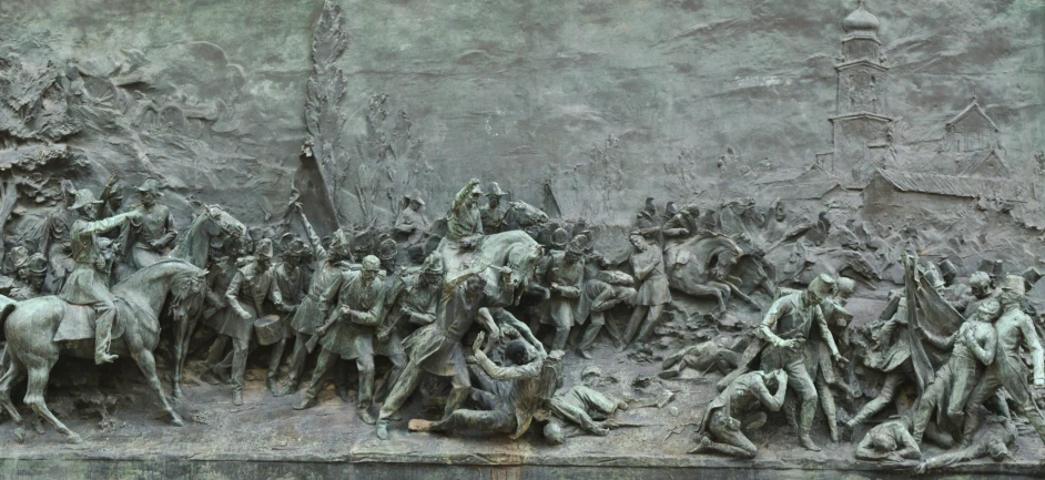 the scene in a clay sculpture depicts soldiers fighting over civilians