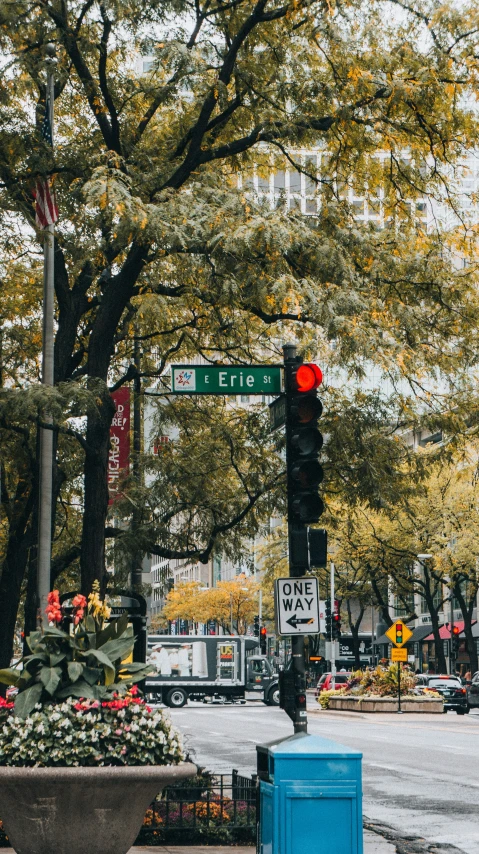 a traffic light sitting on the side of a street