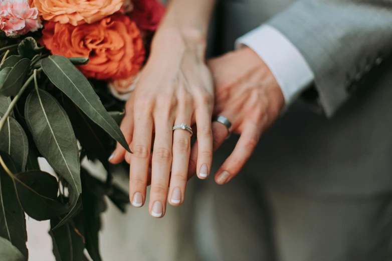 a close up of two people holding each other