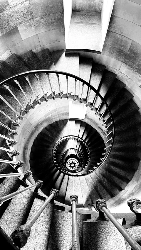 spiral staircase view of the top with black and white filter