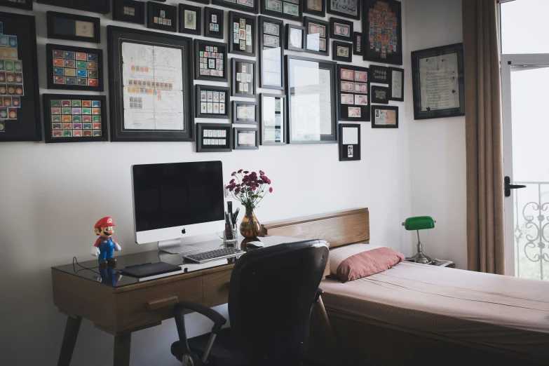 a small desk with a computer on top of it