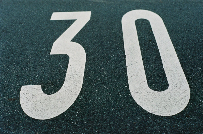 a close - up of a number on the ground