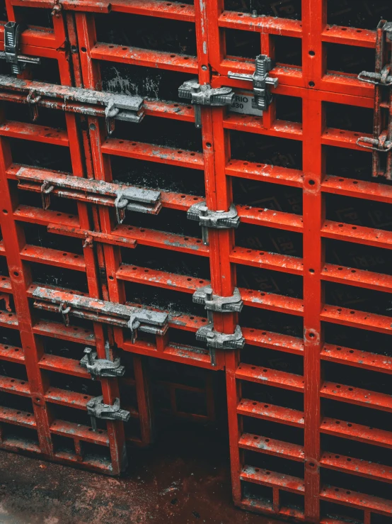 large group of metal shelves stacked together and empty