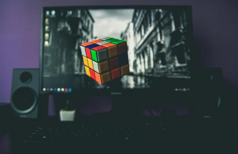 the rubik cube is attached to the computer screen