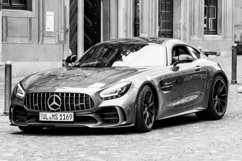 a mercedes c coupe parked on a street