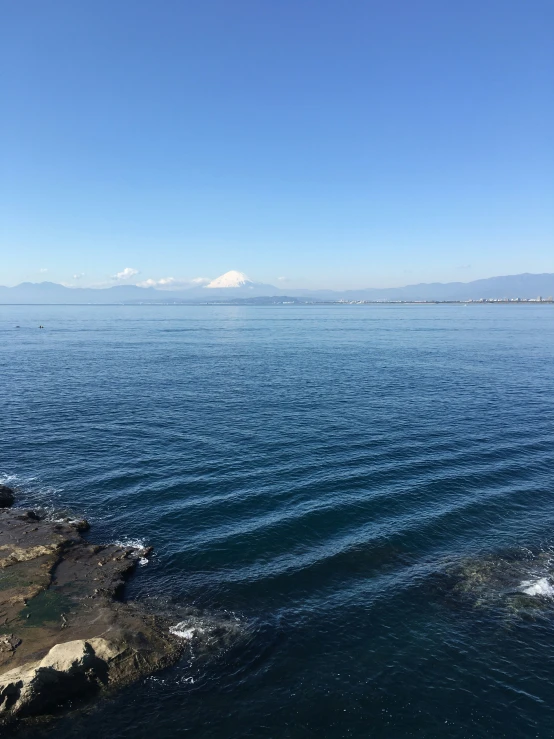 an image of a body of water that is blue and clear