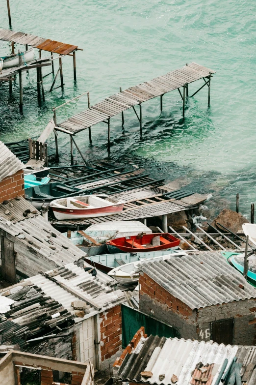 a small boat is parked near the dock