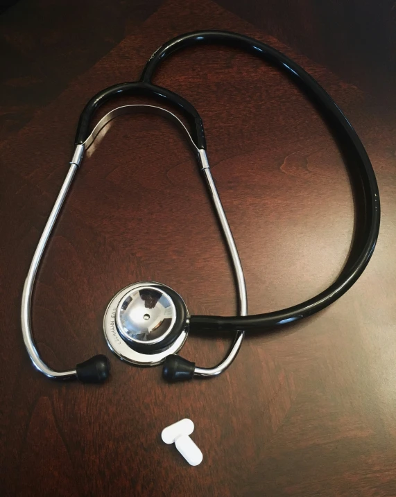 a stethoscope sits on top of a table