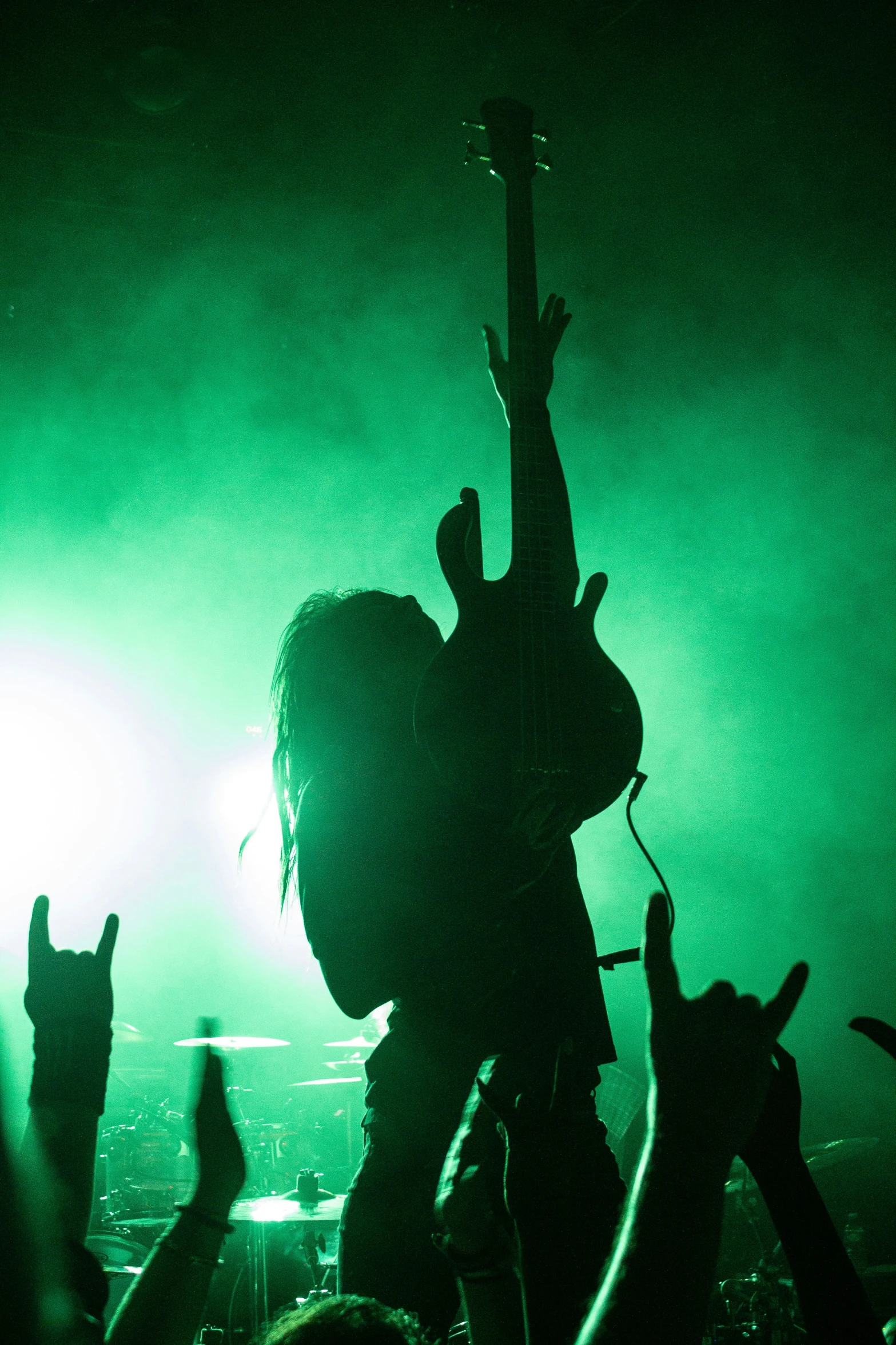 a person with a guitar and some lights